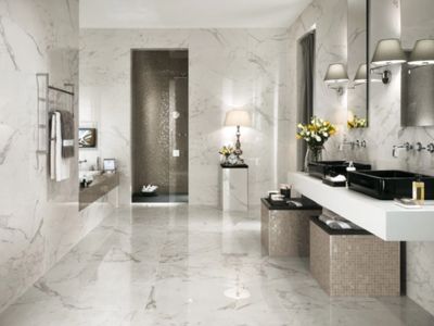 Employ Mirrored or Glossy Tiles